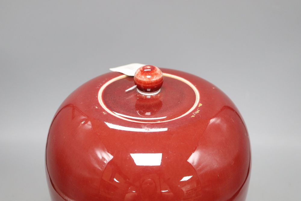 A 19th century Chinese flambe vase and cover